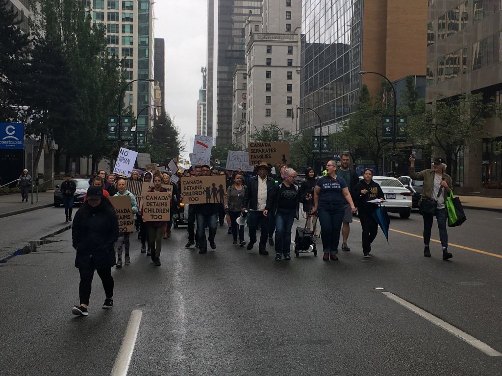 Protesters opposed to U.S. President Donald Trump's 'Zero Tolerance&#039 immigration policy take to the streets of Vancouver on Saturday June 30