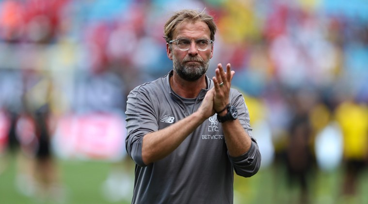 Liverpool Coach Jurgen Klopp applauds the fans after the second half of an International Champions Cup soccer match between Liverpool and the Borussia Dortmund at Bank of America Stadium