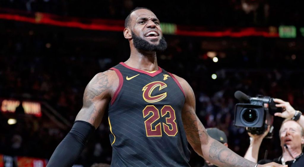 LeBron James of Cleveland Cavaliers speaks with GM Koby Altman by phone when free agency opens