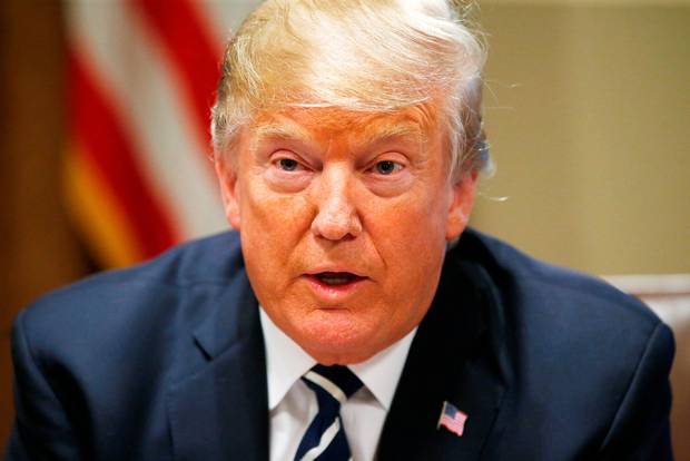 U.S. President Donald Trump speaks about his summit meeting with Russian President Vladimir Putin as he begins a meeting with members of the U.S. Congress at the White House in Washington