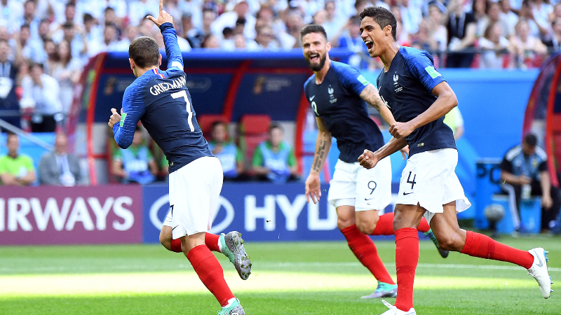 France forward Antoine Griezmann, defender Rafael Varane and forward Olivier Giroud