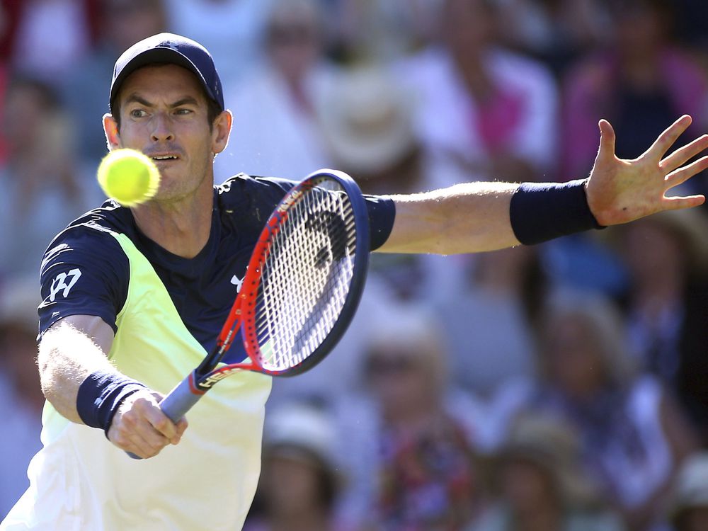 Britain's Andy Murray returns to Britain's Kyle Edmund during day four of the Eastbourne Tennis Tournament at Devonshire Park Eastbourne England Wednesday