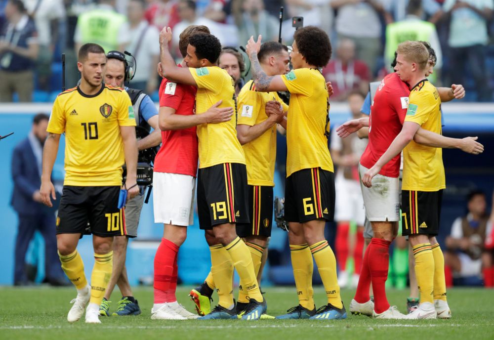 England’s Harry Kane and Belgium's Mousa Dembele embrace at the end of the England Belgium match at the Saint Petersburg Stadium in Russia