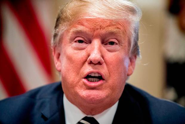 President Donald Trump speaks to members of the media as he meets with members of Congress in the Cabinet Room of the White House Tuesday