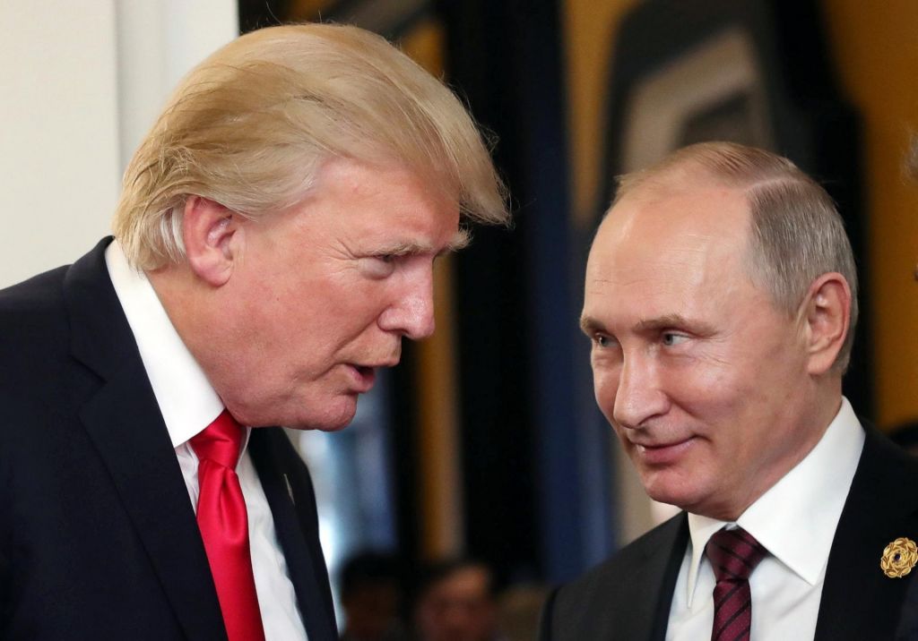 President Vladimir Putin and President Donald Trump talk during a break of a leader's meeting at the 25th Asia Pacific Economic Cooperation summit in Da Nang Vietnam. EPA