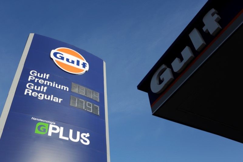 Fuel prices are displayed at a Gulf Oil petrol station in the municipality of Guadalupe