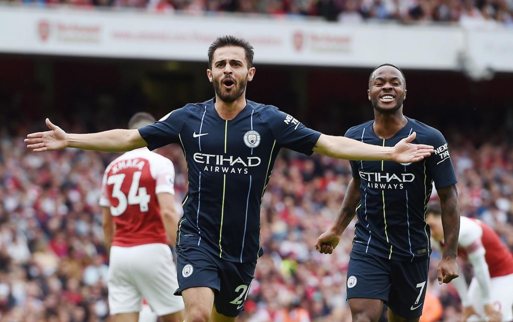 Bernardo Silva celebrates after giving Manchester City a 2-0 lead against Arsenal at Emirates Stadium. EPA