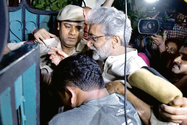 Former PUCL secretary Gautam Navlakha at his New Delhi residence after being arrested by the Pune Police on Tuesday in connection with the Bhima Koregaon violence