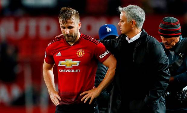 Manchester United's Luke Shaw and manager Jose Mourinho after the match