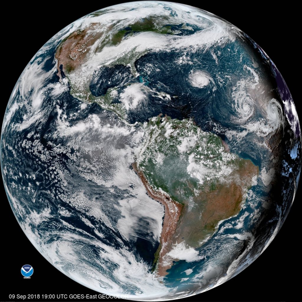 An enhanced satellite image showing Hurricane Florence third from right west of Isaac and Helene