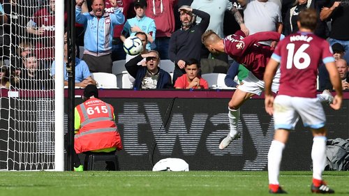 Andriy Yarmolenko steers his header past the post