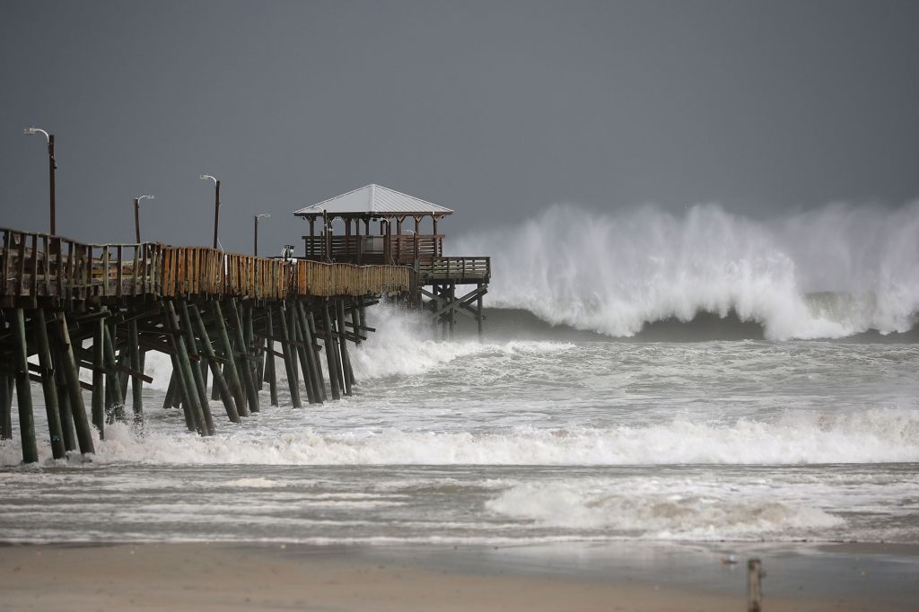 Wind, flooded roads herald approach of Hurricane Florence in North Carolina