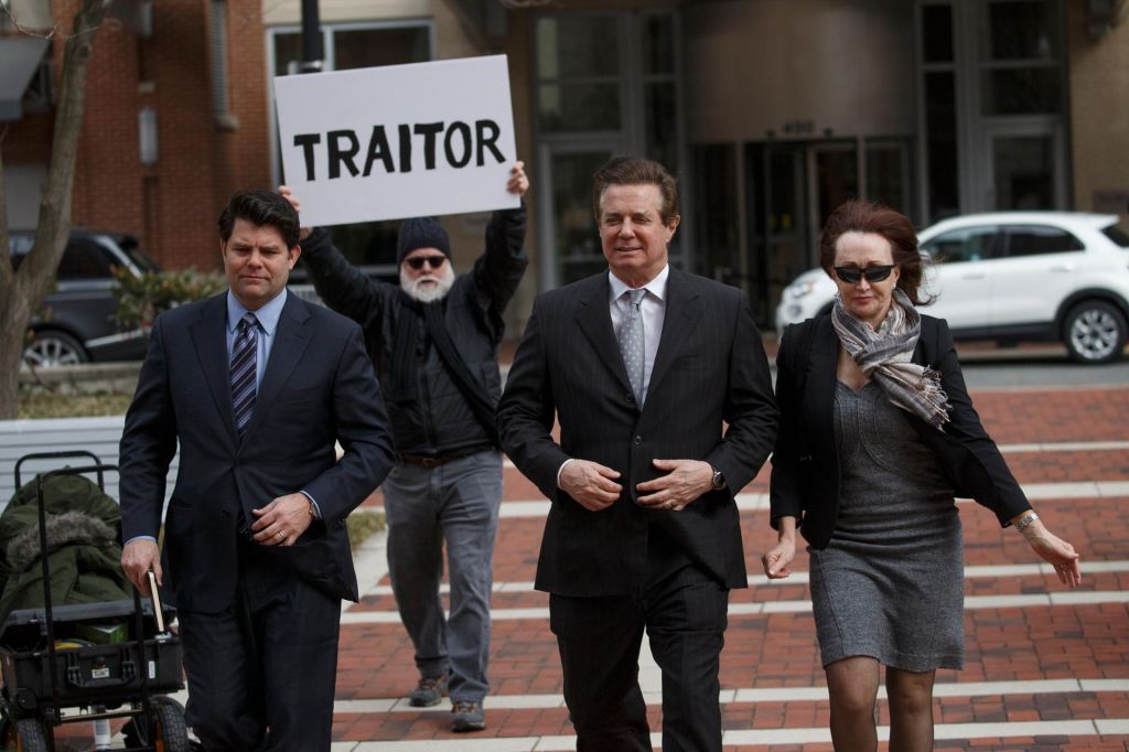 Former Trump Campaign Manager Paul Manafort, with his wife Kathleen Manafort, arrives for arraignment at the Federal Courthouse in Virginia. EPA