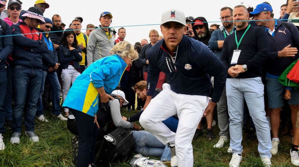 Brooks Koepka with an injured spectator