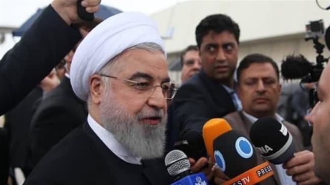 Iran’s President Hassan Rouhani is interviewed by media outlets at John F. Kennedy International Airport in New York