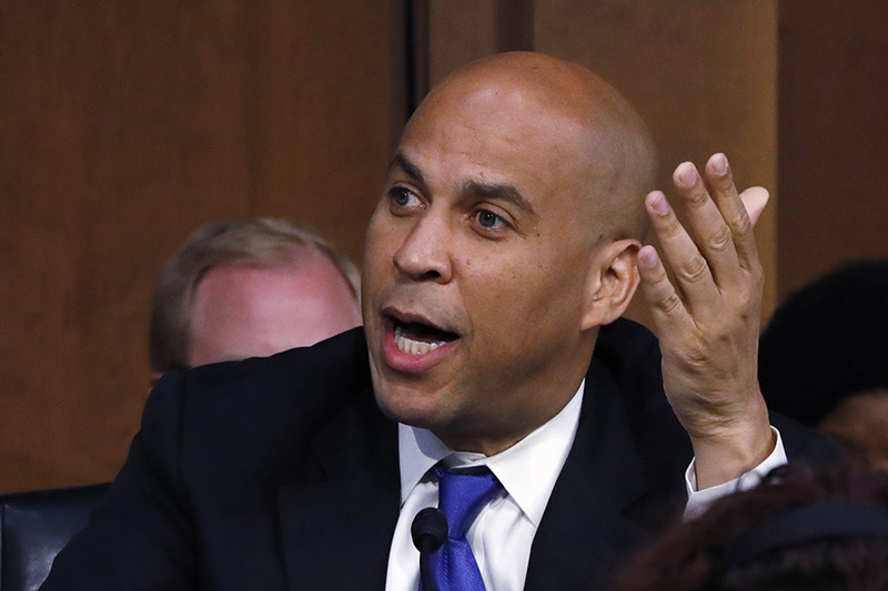 Sen. Cory Booker D-N.J. asks a question of the chairman during the confirmation hearing for Supreme Court nominee Brett Kavanaugh on Tuesday