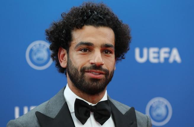 Egypt's Liverpool FC forward Mohamed Salah arrives to attend the draw for UEFA Champions League football tournament at The Grimaldi Forum in Monaco