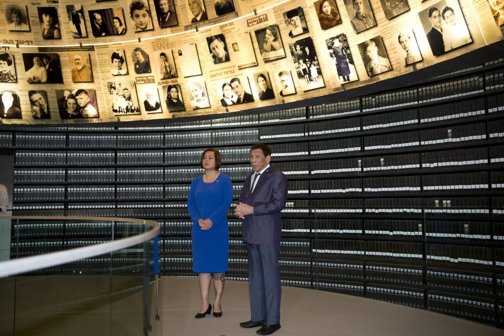 Philippine President Rodrigo Duterte and his daughter Sara visit the Hall of Names at the Yad Vashem Holocaust Memorial in Jerusalem Monday Sept 3