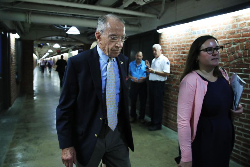 Senate Judiciary Committee Chairman Sen. Chuck Grassley R-Iowa walks through a tunnel towards the Dirksen Senate Building on Capitol Hill in Washington Wednesday Sept. 19 2018