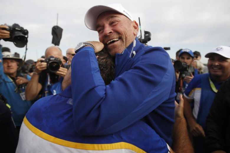 Team Europe's captain Thomas Bjorn celebrates with Francesco Molinari after winning the Ryder Cup on Sept 30 2018