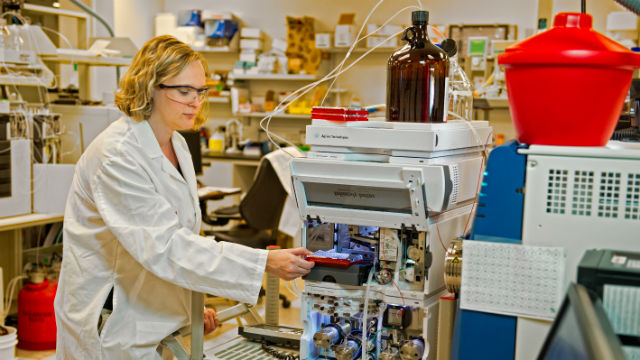 A researcher in an Eli Lilly lab. Courtesy Eli Lilly and Co