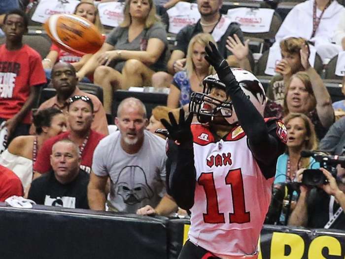 Jacksonville Sharks wide receiver Tiger Jones catches a pass for a touchdown against the Tampa Bay Storm during the first half of Arena Football League action at the Jacksonville Memorial Arena in Jacksonville Fla. Saturday