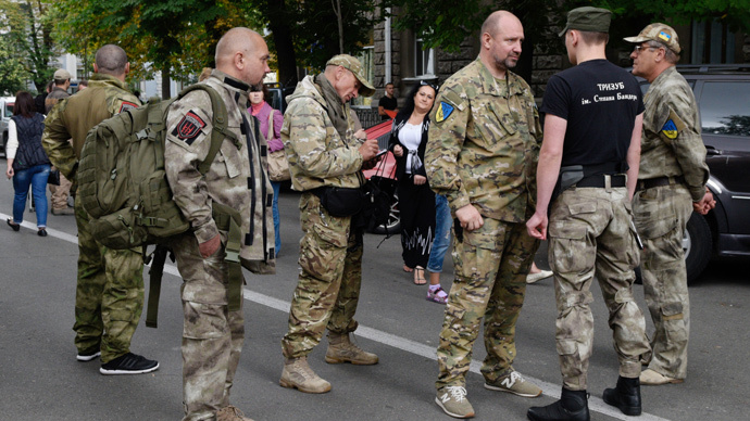 Right Sector members and their supporters during an ongoing protest rally near the Ukrainian presidential administration building