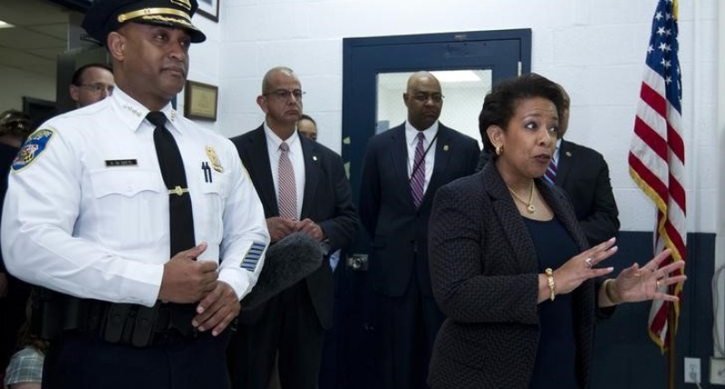 U.S. Attorney General Loretta Lynch accompanied by Baltimore police Commissioner Anthony Batts, speaks to police officers during a visit to the Central District of Baltimore Police Department in Baltimore Maryland United States