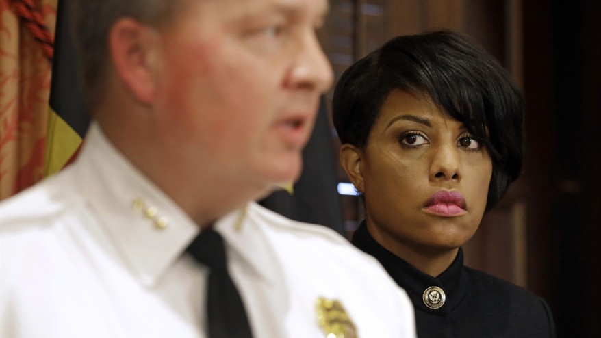 Baltimore mayor fires police commissioner