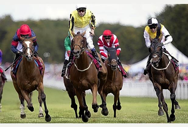 Big Orange ridden by Jamie Spencer on the way to winning the Qatar Goodwood Cup during day three of the Glorious Goodwood Festival