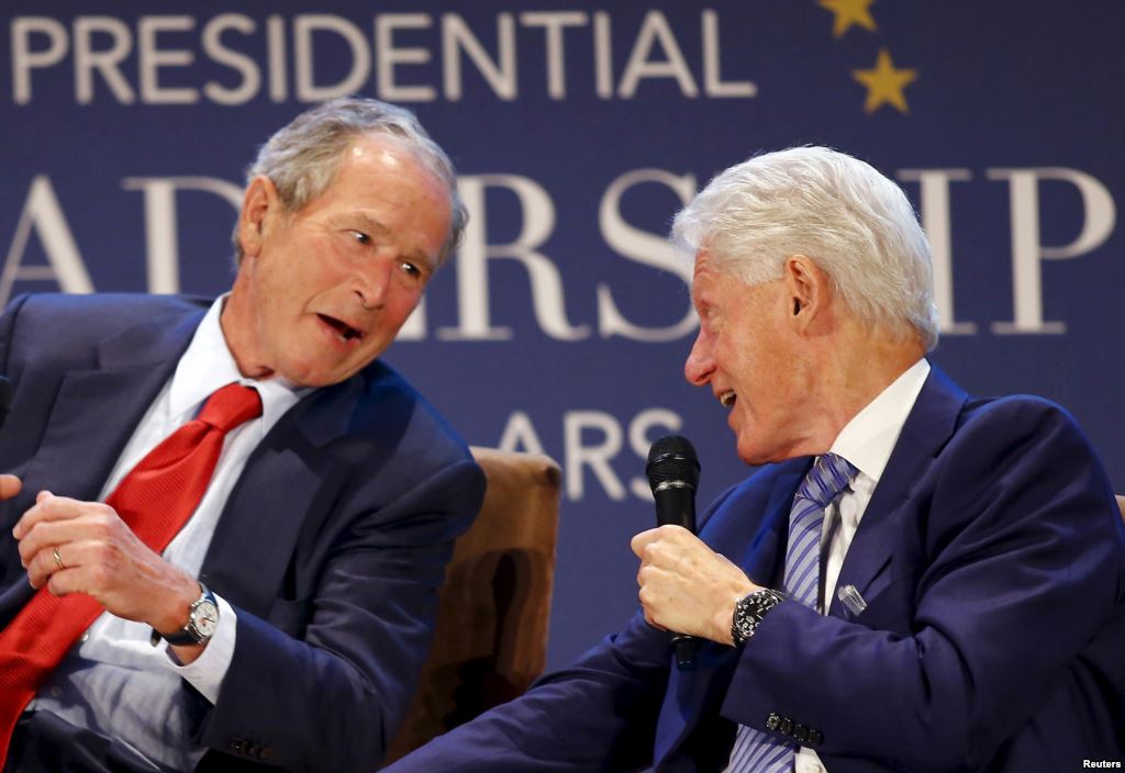 Former U.S. Presidents George W. Bush and Bill Clinton share a laugh during a moderated conversation at the graduation of the inaugural class of the Presidential Leadership Scholars program a partnership between the presidential centers of George W