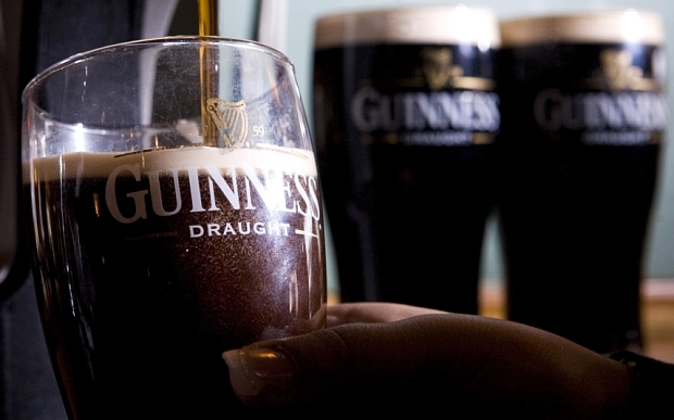 An employee pours a pint of Guinness a Diageo product at a public house in Hornchurch UK