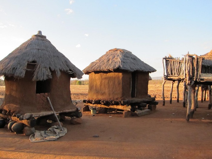 Modern grain bins outside huts in southern Africa. The bins are very similar to Iron Age bins