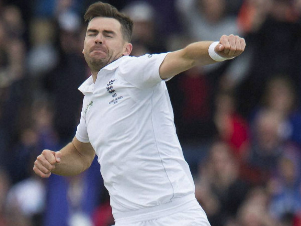 England's James Anderson celebrates after taking the wicket of Australia's Michell Marsh caught by Jos Buttler for 0