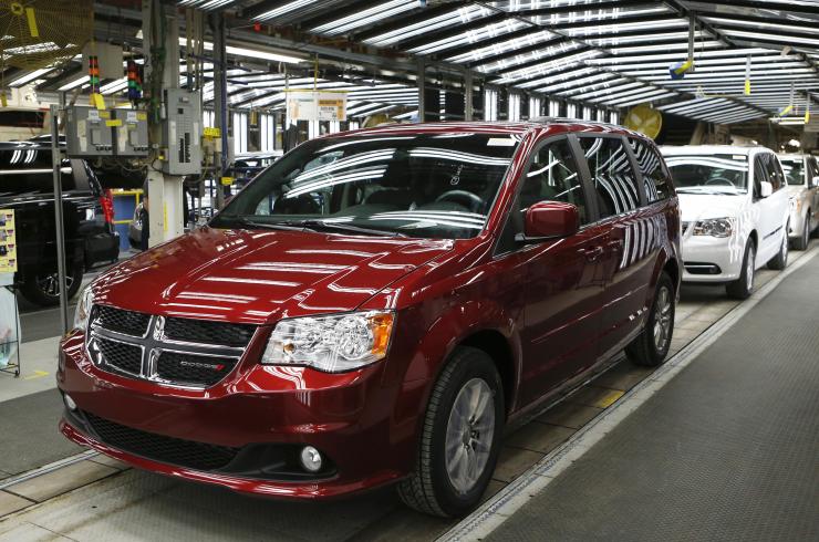 Fiat Chrysler's Dodge minivans move down the final production line at the Windsor Assembly Plant in Windsor Ontario