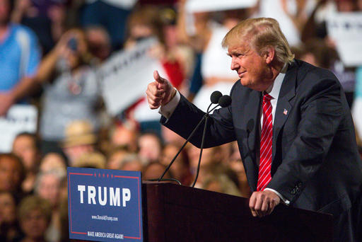 Republican Presidential candidate Donald Trump addresses supporters during a political rally at the Phoenix Convention Center