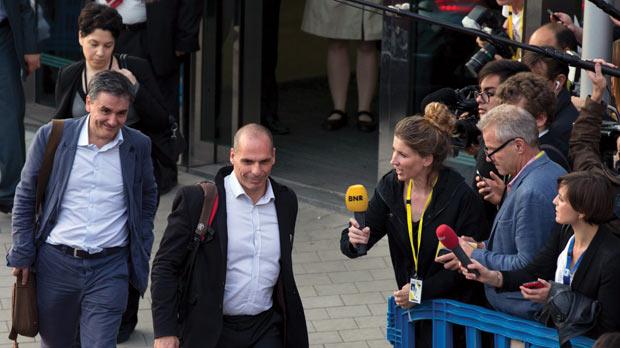 Greek Finance Minister Yanis Varoufakis and Greek chief government economics spokesman Euclid Tsakalotos leave a eurozone finance ministers emergency meeting in Brussels yesterday which ended without agreement and will resume today