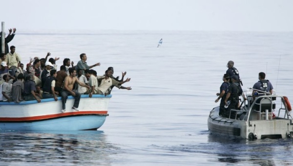 Italian coast guards rescue migrants in the Mediterranean this week in a boat similar to this archive image