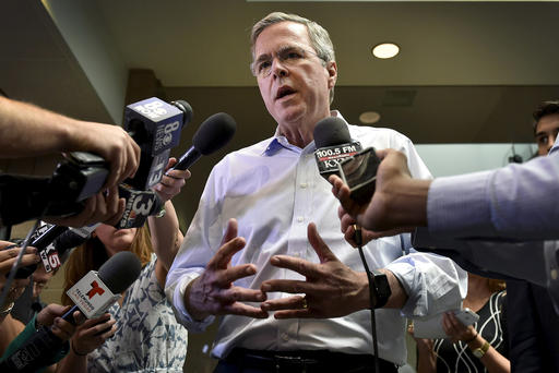 Republican presidential candidate and former Florida Governor Jeb Bush speaks with members of the media after a town hall meeting in Henderson Nevada