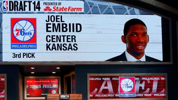 Unseen potential A video screen shows the selection of Joel Embiid of Kansas as the #3 overall pick in the first round by the Philadelphia 76ers during the 2014 NBA Draft at Barclays Center