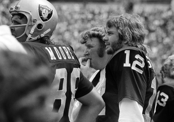 Oakland Raiders coach John Madden center and quarterback Ken Stabler watch the team's NFL football game against the Pittsburgh Steelers in Oakland Calif. Stabler who led the Raiders to a Super Bowl vict