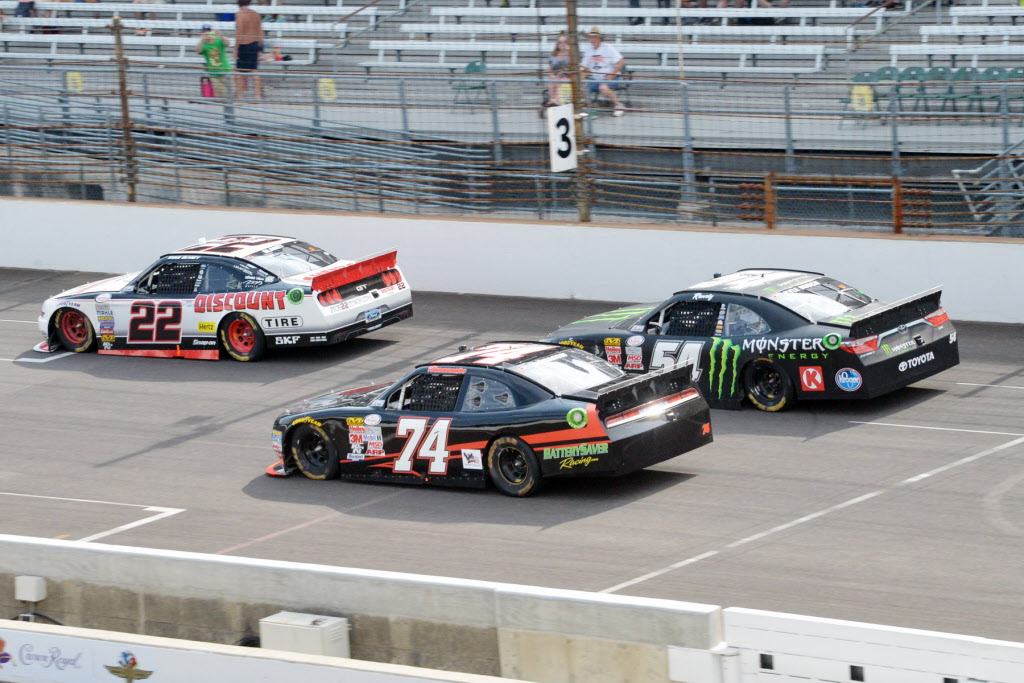 Ryan Blaney is chased by Kyle Busch