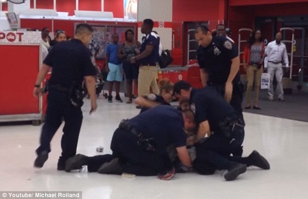 Excessive force? Police are being criticized after video shows at least two officers punching Alandro Brisett on the ground after he got into a confrontation at Target