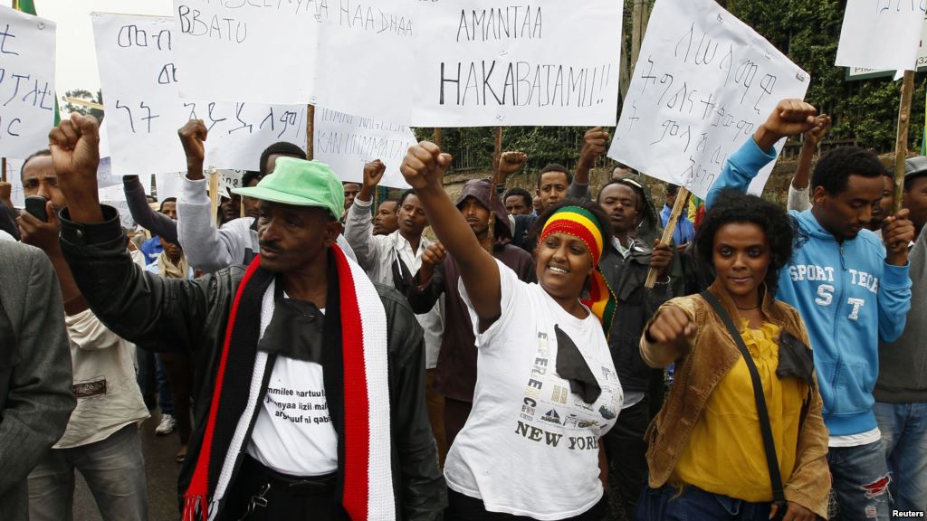 FILE- People protesting against an earlier security force attack on a student rally in Orono shout slogans during a demonstration organized by the opposition Ethiopian Federal Democratic Unity Forum in Addis Ababa