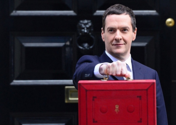 Chancellor of the Exchequer George Osborne outside 11 Downing Street London before heading to the House of Commons to deliver his annual Budget statement. PRESS ASSOCIATION