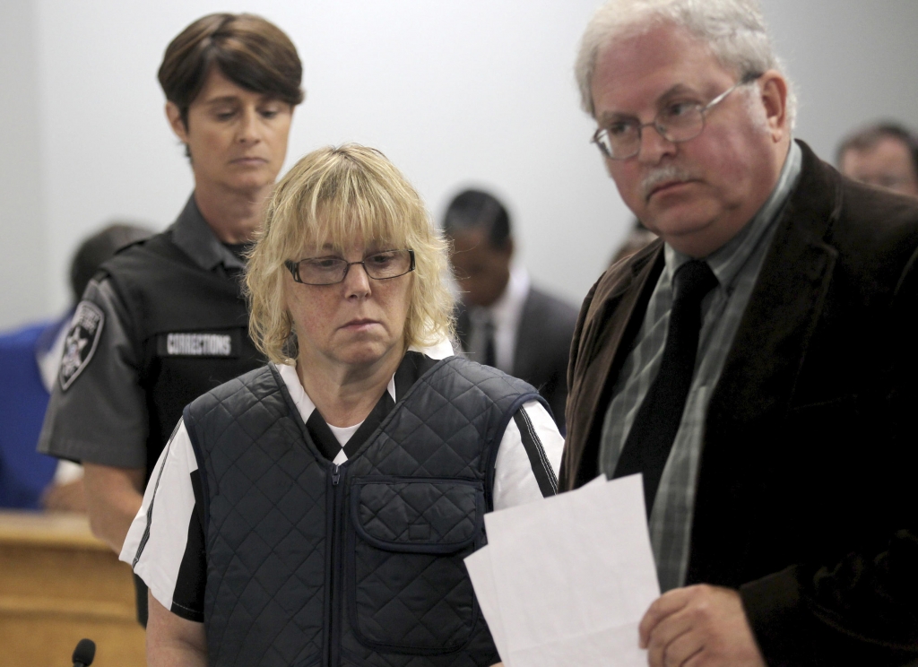 Joyce Mitchell who has reached a plea deal over charges that she aided a prison escape is seen here during a June court date along with her lawyer Steven Johnston