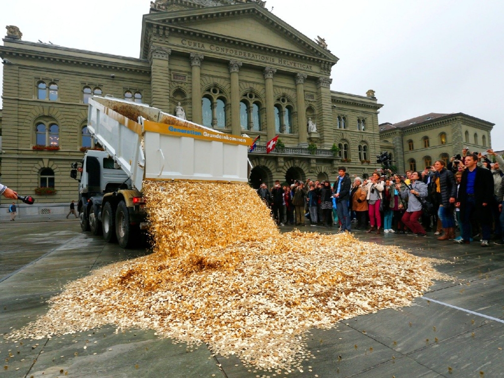 REUTERS  Denis BalibouseA truck dumps five cent coins in the centre of the Federal Square in Bern Switzerland