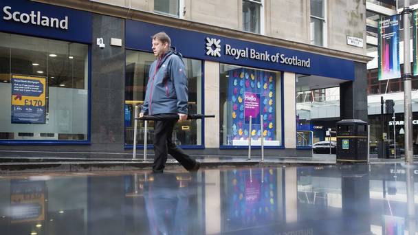 Royal Bank of Scotland took another 1.3 billion pound hit for banking scandal fines and warned of more charges to come