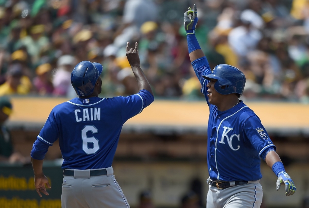 Salvador Perez #13 and Lorenzo Cain #6 of the Kansas City Royals