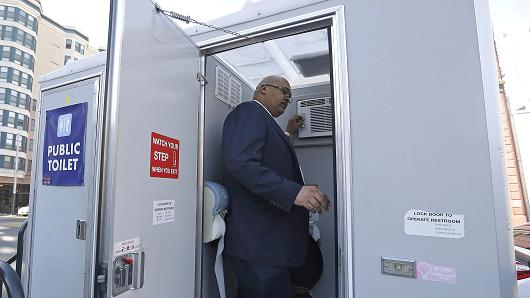 Mohammed Nuru director of San Francisco Public Works talks about the features of a public toilet at the Tenderloin Pit Stop as he is interviewed in San Francisco